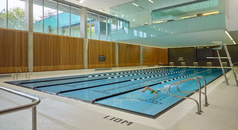 Person lap swimming in the indoor lap pool at Branksome Hall